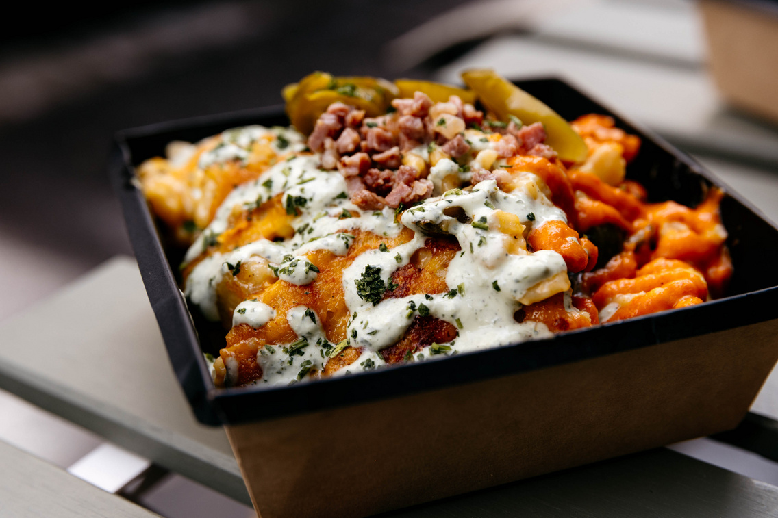 Noc n Cheese — loaded nokedli with cheese sauce and jalapeños