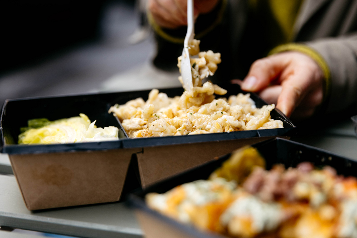Multiple nokedli boxes ready to serve